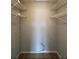 Empty walk-in closet with wire shelving ready for storage and organization at 115 Oyster Bay Byu # 115, Altamonte Springs, FL 32701
