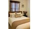 Bedroom with neutral decor, and stylish accents for a cozy and inviting space at 13 W Marbrisa Way, Kissimmee, FL 34743