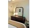 Bedroom showcasing a stylish vanity and neutral decor for a serene atmosphere at 13 W Marbrisa Way, Kissimmee, FL 34743