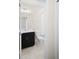 Bathroom featuring a dark vanity with a single sink and a toilet next to the shower at 1312 Royal St George Blvd, Davenport, FL 33896
