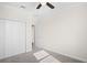 Bright and airy bedroom with a ceiling fan and closet at 1312 Royal St George Blvd, Davenport, FL 33896