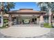 Clubhouse featuring shaded lounge areas and access to community amenities at 1312 Royal St George Blvd, Davenport, FL 33896