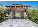 Clubhouse entry features stone accents and covered entrance at 1312 Royal St George Blvd, Davenport, FL 33896