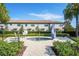 Inviting outdoor hot tub surrounded by manicured landscaping and nearby seating at 1312 Royal St George Blvd, Davenport, FL 33896