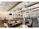 Community game room with ample seating, a pool table, and a kitchen bar at 1312 Royal St George Blvd, Davenport, FL 33896