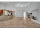 Spacious living room with fireplace, open to the kitchen and dining area at 13130 Meergate Cir, Orlando, FL 32837