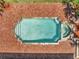 Aerial view of a beautiful pool, hot tub and brick patio at 13130 Meergate Cir, Orlando, FL 32837