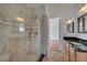 Stylish bathroom featuring tiled shower and vanity with granite countertops at 13130 Meergate Cir, Orlando, FL 32837