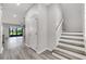 Foyer with hardwood floors and stairs at 1628 Portofino Meadows Blvd, Orlando, FL 32824