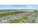 Aerial view of a community featuring a neighborhood layout with many homes and green space at 172 Roseville Dr, Haines City, FL 33844