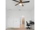 Bright, empty bedroom offering neutral walls, a ceiling fan, and access to an adjoining bathroom at 172 Roseville Dr, Haines City, FL 33844