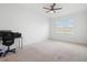 Large and bright bedroom with neutral walls, carpeted floor, and a large window at 172 Roseville Dr, Haines City, FL 33844