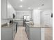 Spacious kitchen featuring granite countertops, stainless steel appliances, and ample cabinetry at 172 Roseville Dr, Haines City, FL 33844