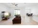 Spacious and airy living room showcasing the open floor plan and sliding doors to the outdoors at 172 Roseville Dr, Haines City, FL 33844