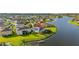 Beautifully landscaped waterfront home with a personal dock in a well-maintained suburban community at 1760 Boat Launch Rd, Kissimmee, FL 34746