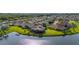 Beautifully landscaped waterfront home with a personal dock in a well-maintained suburban community at 1760 Boat Launch Rd, Kissimmee, FL 34746