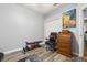 This flex bedroom space features gray walls, hardwood floors, lots of natural light, and a roll top desk at 1760 Boat Launch Rd, Kissimmee, FL 34746
