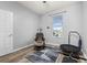 This flex bedroom space features gray walls, hardwood floors, and lots of natural light at 1760 Boat Launch Rd, Kissimmee, FL 34746