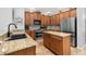 Updated kitchen features granite countertops, stainless steel appliances, and plenty of cabinet space at 1760 Boat Launch Rd, Kissimmee, FL 34746
