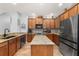Updated kitchen features granite countertops, stainless steel appliances, and plenty of cabinet space at 1760 Boat Launch Rd, Kissimmee, FL 34746