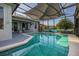 Inviting screened-in pool area, perfect for relaxing and entertaining outdoors at 1760 Boat Launch Rd, Kissimmee, FL 34746