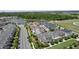 Beautiful aerial view of the neighborhood showcasing the lake, walking path and community at 1801 Coastal Ct, Celebration, FL 34747