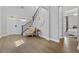 Bright foyer with hardwood floors and a view into another room at 1801 Coastal Ct, Celebration, FL 34747