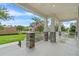 Charming porch with decorative columns and railings, offering a relaxing outdoor space at 1801 Coastal Ct, Celebration, FL 34747