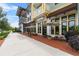 Charming storefront with outdoor seating, attractive awnings, and a pedestrian-friendly atmosphere at 1801 Coastal Ct, Celebration, FL 34747
