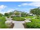 Street view highlighting well-maintained townhomes, lush landscaping and community charm at 1801 Coastal Ct, Celebration, FL 34747