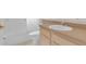 Bathroom featuring a sink, shower and toilet at 231 Lewis Dr, Davenport, FL 33837