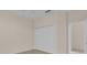 Bedroom features a closet for storage space and tile flooring at 231 Lewis Dr, Davenport, FL 33837