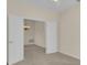 Bedroom featuring an entrance into an adjacent room at 231 Lewis Dr, Davenport, FL 33837