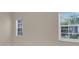 Bedroom featuring two windows letting in an abundance of natural light at 231 Lewis Dr, Davenport, FL 33837