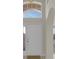 Welcoming foyer with a high ceiling, tiled floor, and a white front door with side-light at 231 Lewis Dr, Davenport, FL 33837