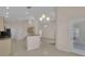 Open-concept kitchen offering a breakfast bar and stainless-steel appliances at 231 Lewis Dr, Davenport, FL 33837