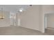Bright living room with neutral walls, carpet flooring, and ceiling fan at 231 Lewis Dr, Davenport, FL 33837