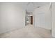 Neutral bedroom featuring a ceiling fan, double closets, and soft carpeting at 2376 Nightingale Ln, Kissimmee, FL 34746