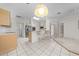 Kitchen featuring stainless steel appliances and a view into the Gathering room at 2376 Nightingale Ln, Kissimmee, FL 34746