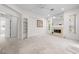 Bright living room featuring a fireplace, built-in shelves, and plenty of natural light at 2376 Nightingale Ln, Kissimmee, FL 34746