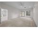Expansive main bedroom with neutral walls and ceiling fan at 2376 Nightingale Ln, Kissimmee, FL 34746