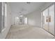 Large main bedroom with ensuite bathroom and sliding glass door access to the patio at 2376 Nightingale Ln, Kissimmee, FL 34746
