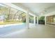 Screened-in lanai that overlooks the pool with ample room for seating at 2376 Nightingale Ln, Kissimmee, FL 34746