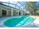 This home features a screened-in pool and covered patio, great for escaping the summer heat at 2376 Nightingale Ln, Kissimmee, FL 34746