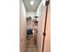 Functional walk-in closet with shelving, offering practical storage solutions in a compact space at 3014 Red Ginger Rd, Kissimmee, FL 34747