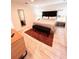 Comfortable bedroom with a large mirror, neutral tones, and ambient lighting at 3014 Red Ginger Rd, Kissimmee, FL 34747