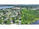 Lovely neighborhood with homes near a green space, and the lake is just steps away at 31 Lake Link Se Cir, Winter Haven, FL 33884