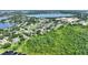 A neighborhood featuring single Gathering homes, backing up to green space and close to the lake at 31 Lake Link Se Cir, Winter Haven, FL 33884