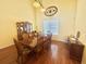 Elegant dining room with a large wooden table and traditional decor at 315 Wildflower Rd, Davenport, FL 33837
