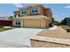 Lovely home with a spacious driveway and well-maintained landscaping at 315 Wildflower Rd, Davenport, FL 33837